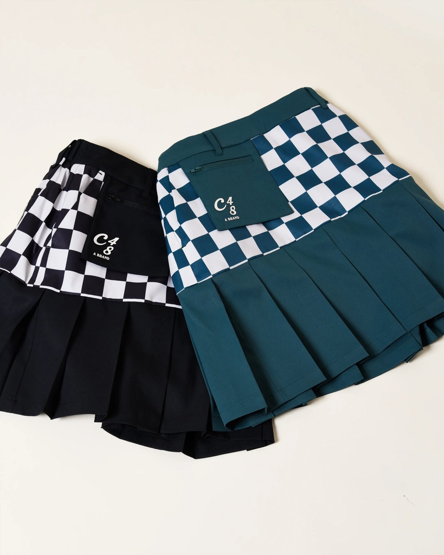 POLY CK PLEATED SK